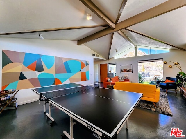 playroom with lofted ceiling with beams