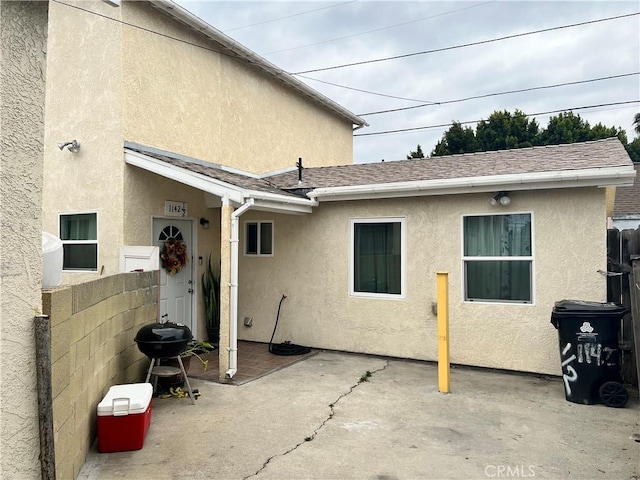 rear view of property with a patio area