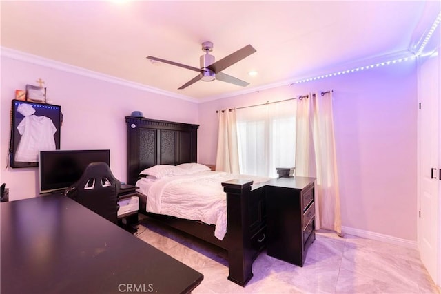 bedroom featuring ceiling fan, baseboards, and ornamental molding