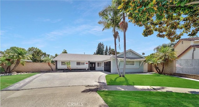 single story home featuring a front lawn