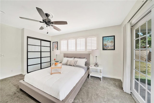 bedroom featuring light carpet and ceiling fan