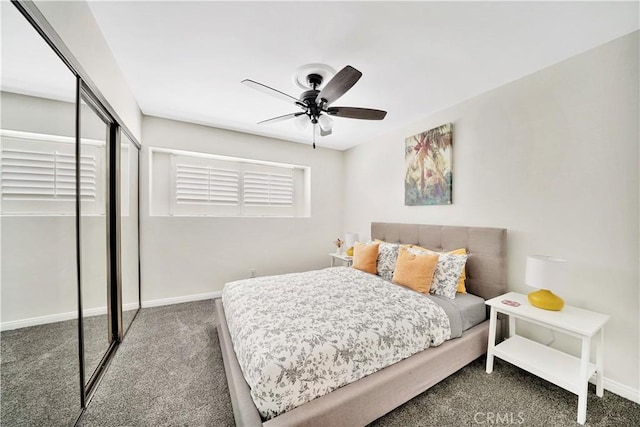 bedroom with a closet, carpet, and ceiling fan