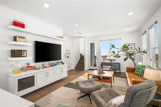 living room featuring dark hardwood / wood-style flooring