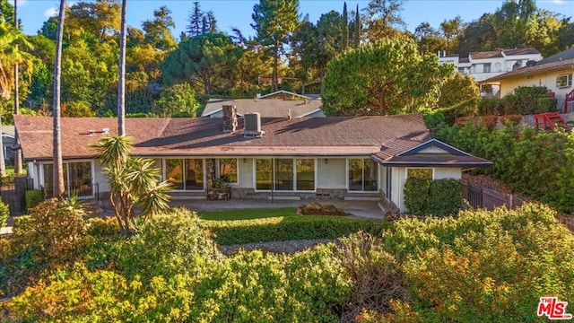 view of front of home featuring a patio