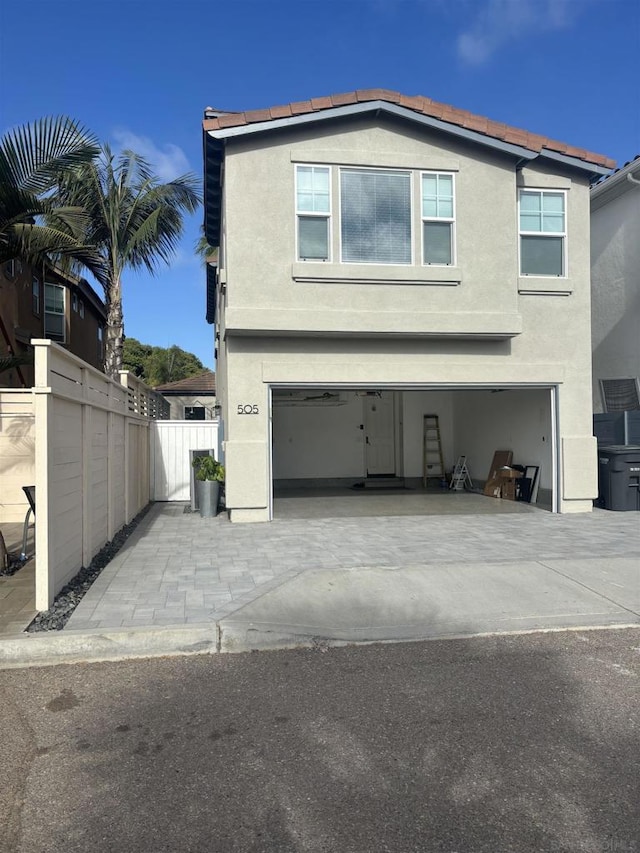 view of property exterior featuring a garage