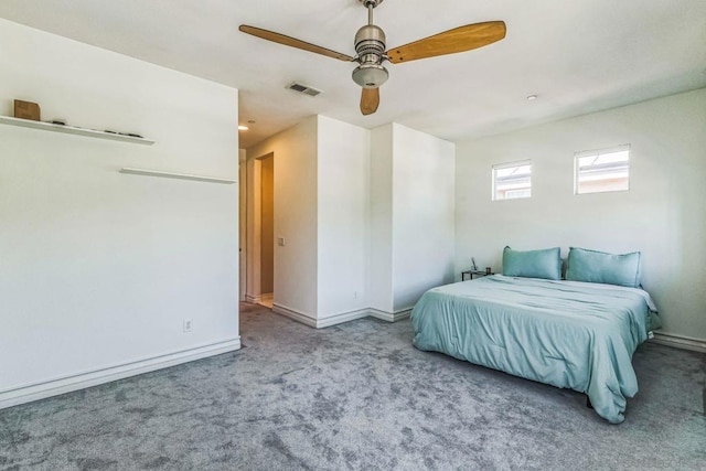 unfurnished bedroom with ceiling fan and light carpet