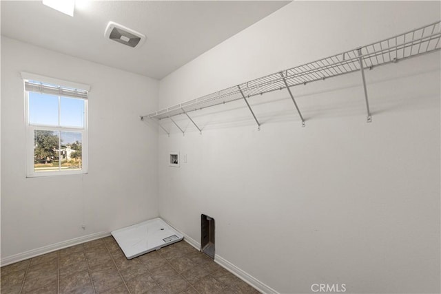 clothes washing area featuring washer hookup