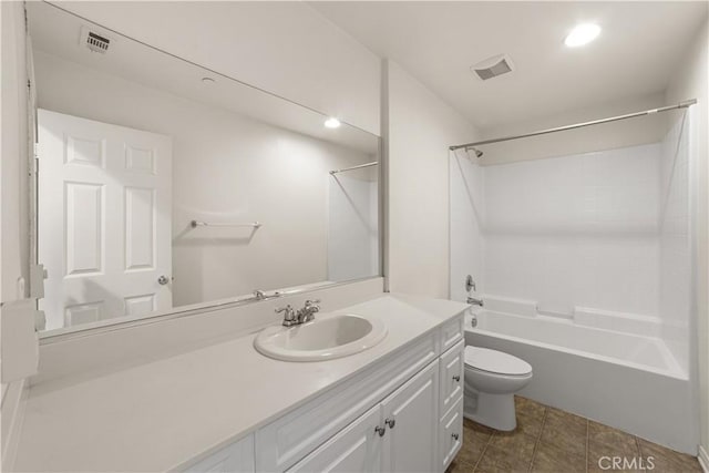 full bathroom featuring tile patterned flooring, vanity, bathtub / shower combination, and toilet