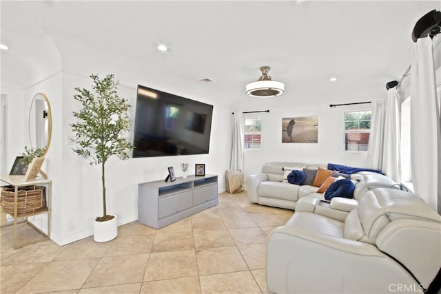 living room with light tile patterned floors