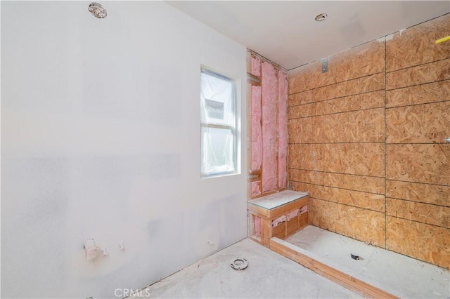 bathroom with concrete floors