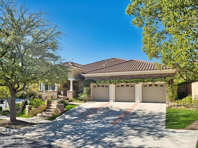 view of front of home featuring a garage