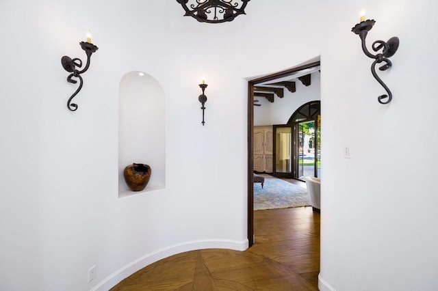 hallway featuring dark wood-type flooring