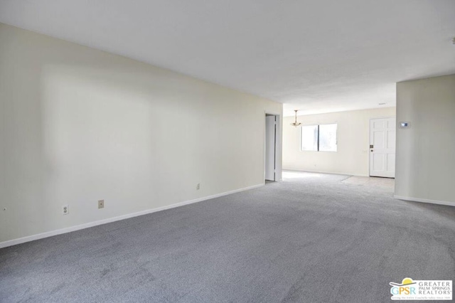 unfurnished room featuring carpet floors