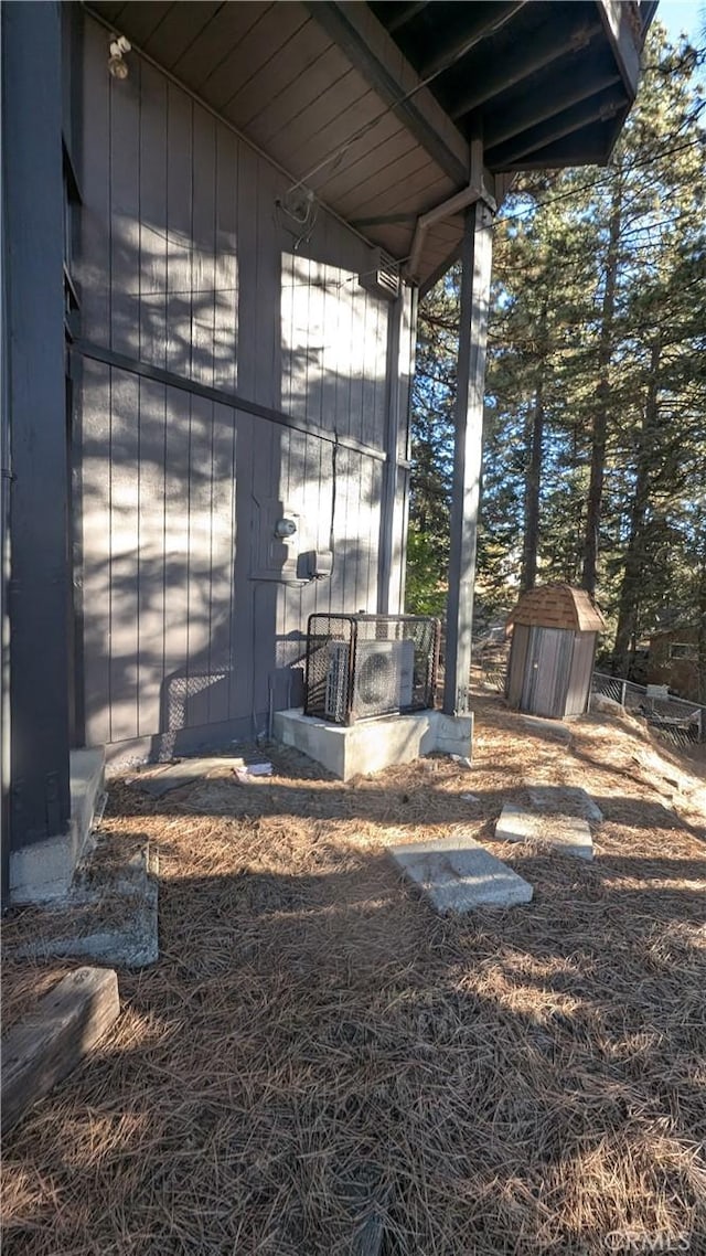 exterior space with a storage shed