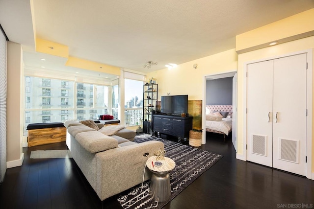 living room with dark wood-type flooring