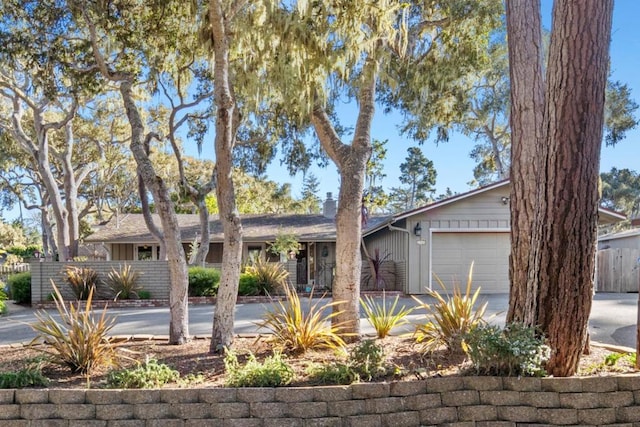 ranch-style house featuring a garage