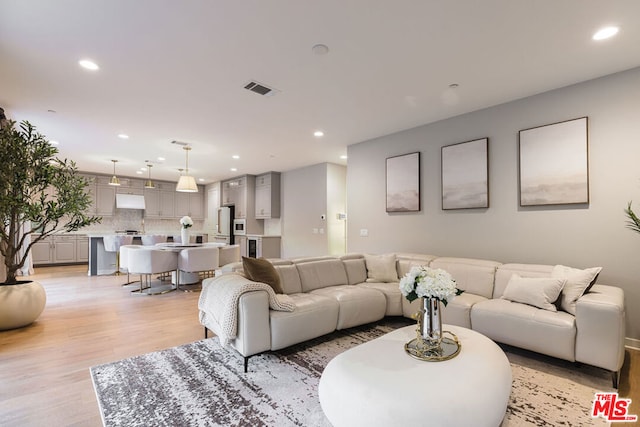 living room featuring light wood-type flooring