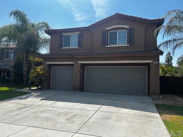 view of front property with a garage