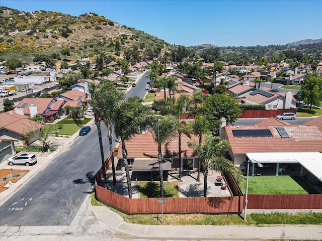 birds eye view of property featuring a mountain view