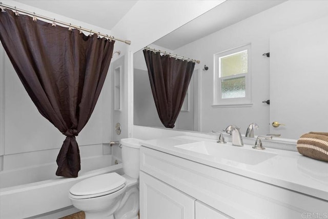 full bathroom featuring vanity, toilet, and shower / tub combo