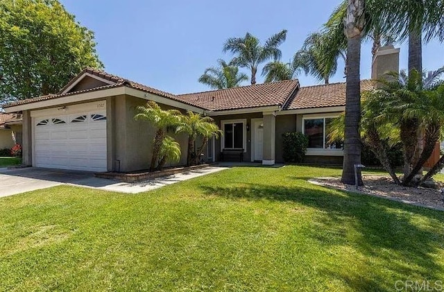 ranch-style house with a garage and a front lawn