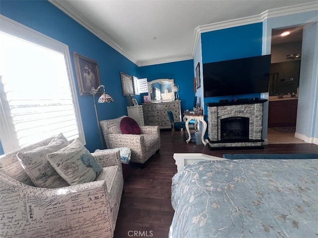 living room featuring a stone fireplace, dark wood-type flooring, and ornamental molding