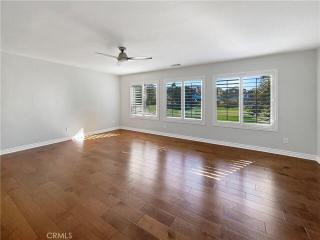 46332 Kohinoor Way, Temecula, CA 92592 - spare room featuring ceiling fan, baseboards, and dark wood-type flooring