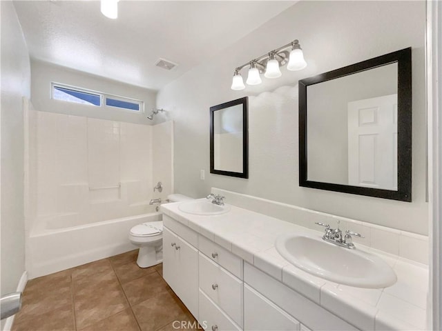 full bathroom featuring shower / bathing tub combination, vanity, toilet, and tile patterned floors