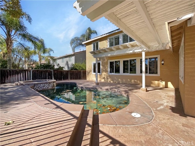 view of swimming pool featuring a pergola, an in ground hot tub, and a patio