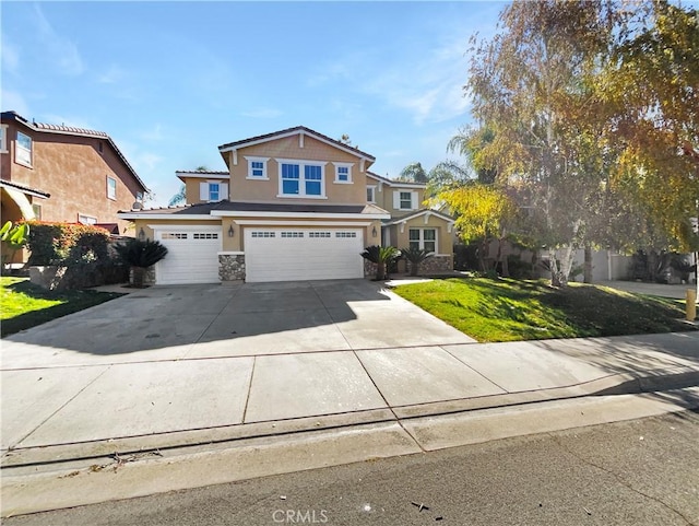 46332 Kohinoor Way, Temecula, CA 92592 - view of front of home with stucco siding, an attached garage, concrete driveway, a front lawn, and stone siding