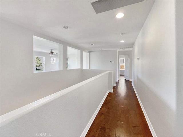 46332 Kohinoor Way, Temecula, CA 92592 - hallway with recessed lighting, dark wood-style flooring, and baseboards