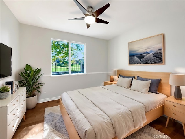 46332 Kohinoor Way, Temecula, CA 92592 - bedroom with baseboards, wood finished floors, and ceiling fan