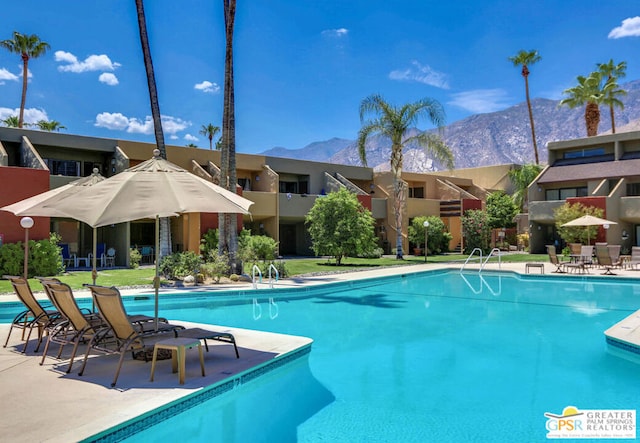 view of pool with a mountain view