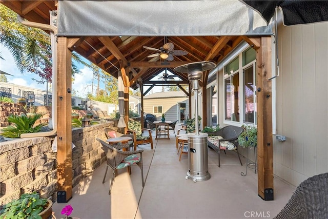 view of patio / terrace featuring ceiling fan and a gazebo