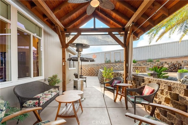 view of patio with ceiling fan and a gazebo