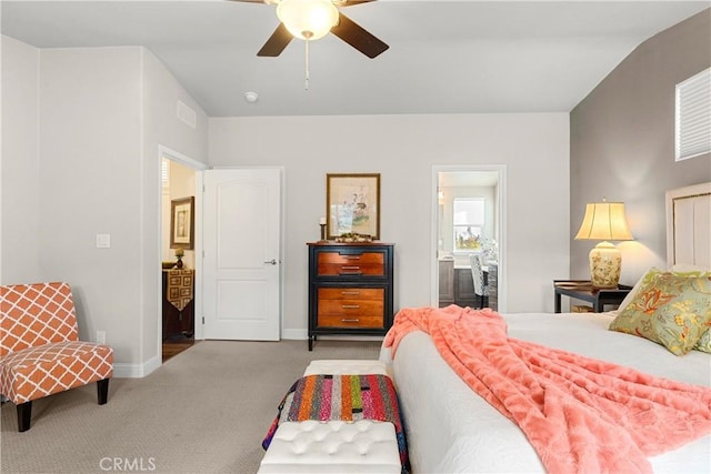 carpeted bedroom with ceiling fan and lofted ceiling