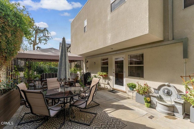 view of patio featuring a gazebo