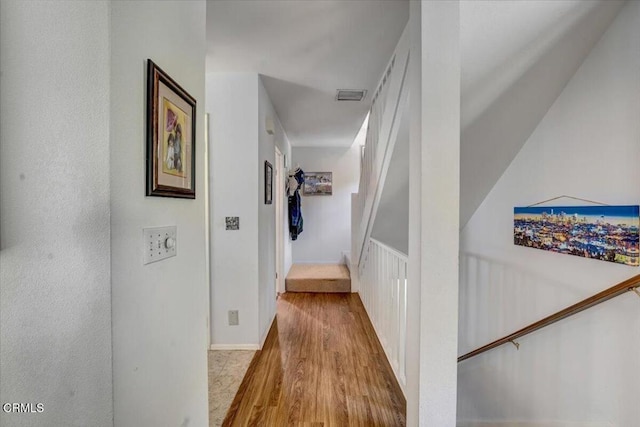 hallway with light wood-type flooring