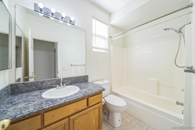 full bathroom with tile patterned flooring, vanity, shower / bath combination, and toilet