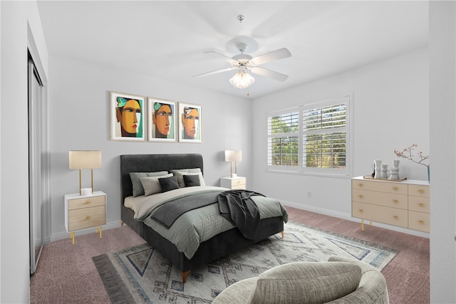 carpeted bedroom with a closet and ceiling fan