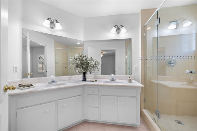 bathroom with vanity, tile patterned floors, and walk in shower