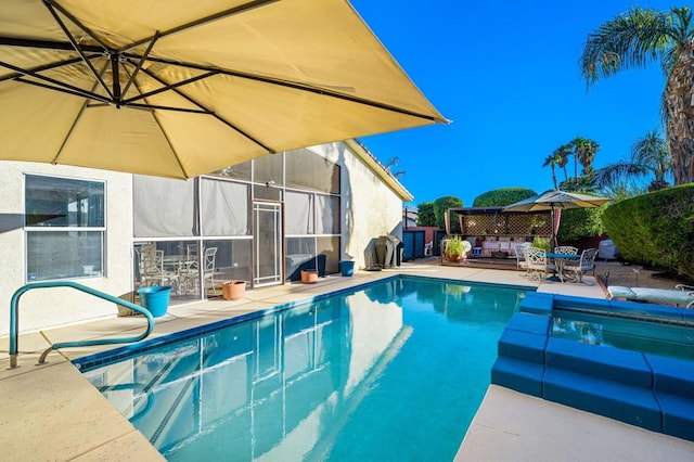 view of pool featuring a patio area