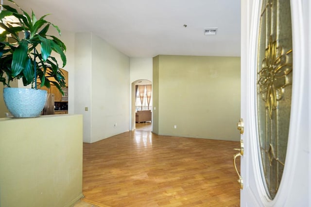 corridor featuring light hardwood / wood-style floors