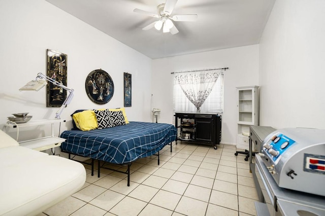 tiled bedroom featuring ceiling fan