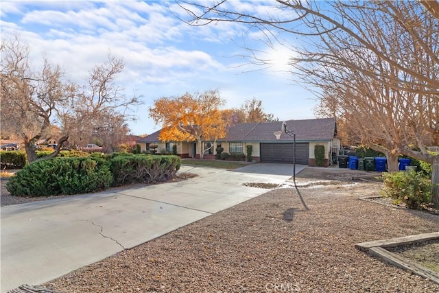 single story home with a garage