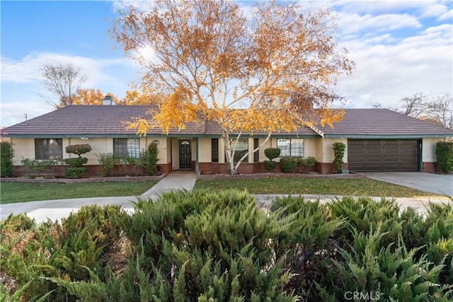 single story home featuring a garage