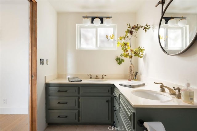 bathroom featuring vanity and wood-type flooring