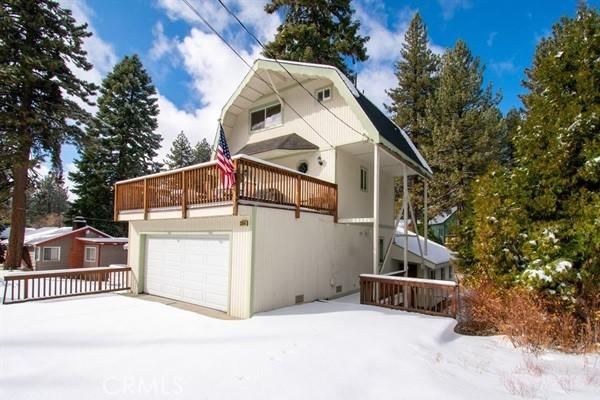33544 Green Valley Lake Rd, Green Valley Lake, CA 92341 - view of front of home with a garage and a balcony