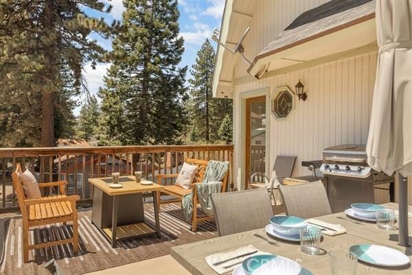 wooden deck featuring an outdoor living space