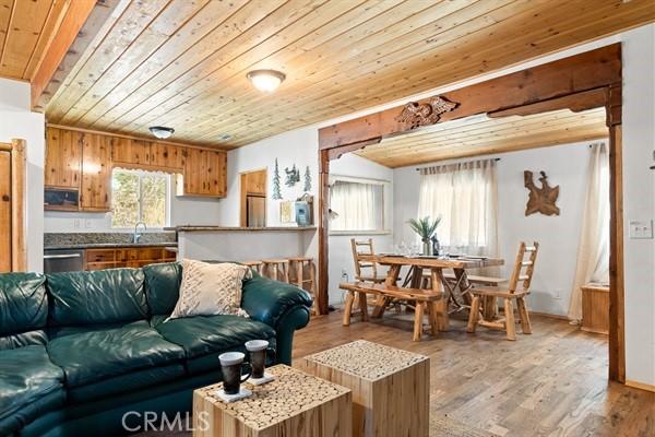 33544 Green Valley Lake Rd, Green Valley Lake, CA 92341 - living room with wood ceiling and light wood-type flooring